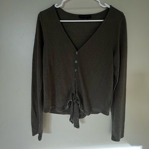 Military green long sleeve top with tie detail in front. Size XS but fits large.